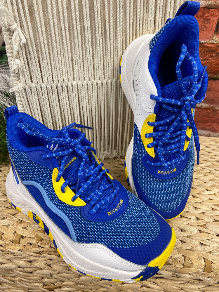 Under armour youth tennis shoes